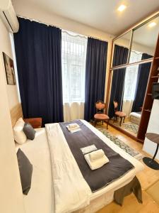 Postel nebo postele na pokoji v ubytování Piccolo Casa Vake