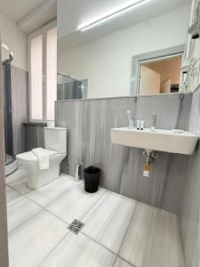 Koupelna v ubytování Piccolo Casa Vake + 17 fotografií