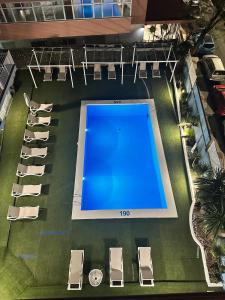 an overhead view of a swimming pool in a building at Apartamentos El Velero in Torremolinos