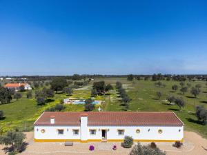 an aerial view of a white building with a red roof at Monte do Sossego by Portugal Active in Ferreira do Alentejo