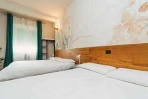 Locanda Da I Baldi tesisinde bir odada yatak veya yataklar