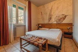 Locanda Da I Baldi tesisinde bir odada yatak veya yataklar +15 fotoğraf