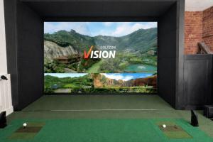a large screen with a picture of a vision on a wall at Fleur De Lis Hotel in Sandwich