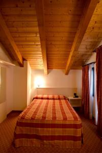 Postel nebo postele na pokoji v ubytování Hotel Gallia