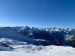 a view of a ski slope with mountains in the background at Haus Ollie in Matrei in Osttirol
