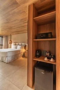 a bedroom with a bed in a room at Hamares Boutique Hotel in Fernando de Noronha