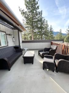 a patio with couches and chairs and a table at LVC0615 - Lake Therapy in Zephyr Cove