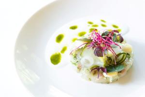 a white plate with a dessert on top of it at Restaurant & Hotel Hoog Holten in Holten