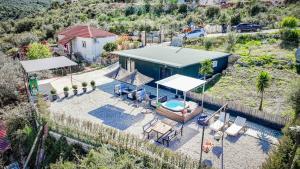 an overhead view of a house with a swimming pool at Lago Calmo Villa in Ksamil