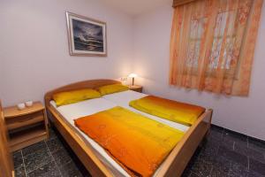 Postel nebo postele na pokoji v ubytování Crikvenica Apartment 17