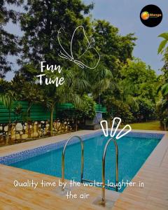 a sign that reads fun timeocity hive by the water laughter in the air at Mango People Farm in Gurgaon