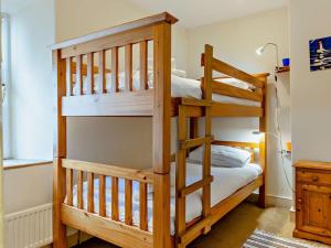a couple of bunk beds in a room at 2 Bed in Aberdyfi oc-dy015 in Aberdyfi