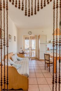 a living room with a bed and a table at Casa Simone in Torella deʼ Lombardi