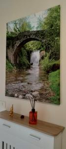 a painting of a bridge over a river at Affittacamere San Nicola in Montella
