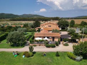 an aerial view of a house with a garden at "IL CASALE DEI GIRASOLI" Country House in Capalbio in Capalbio