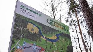a sign with a picture of a park on it at Valmiera Park Hostel in Valmiera