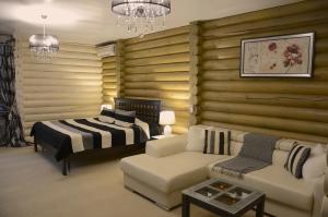 Un pat sau paturi într-o cameră la Villa Club