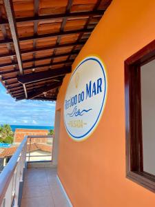 a sign for a mar restaurant on the side of a building at Refúgio do Mar in Nísia Floresta