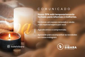 a picture of a candle next to a candle at Hotel Sibara SPA & Convenções in Balneário Camboriú