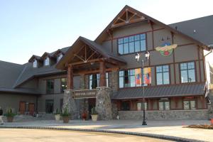 a large building with a sign on the front of it at Premium New 1bd Sunset balcony 3rd flr in Vernon Township