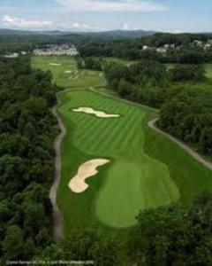 an overhead view of a golf course with a green at Appalachian TOP 4TH FLOOR Studio plus amazing views in Vernon Township