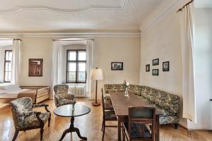 a living room with a couch and a table at Schloss Drosendorf in Drosendorf Stadt