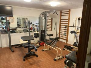 a room with a gym with several equipment in it at Ajaccio Sanguinaires in Ajaccio