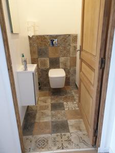 a bathroom with a toilet and a sink at Ajaccio Sanguinaires in Ajaccio