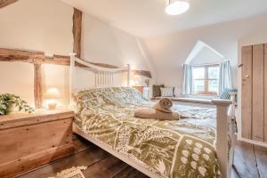 a bedroom with a bed and a window at 4 Bed in Shrawley oc-s34861 in Shrawley
