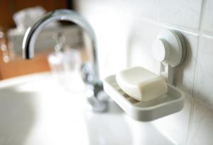 a bathroom with a sink and a faucet at Deluxe Room! in Lucan +13 photos
