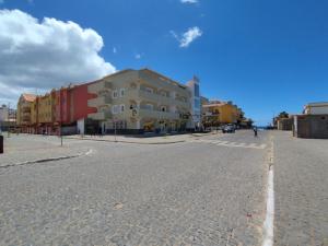 a cobblestone street in a city with a building at Ca Gabbiano 6 in Santa Maria +11 photos