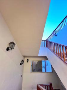 a view from the top of a stairs with a balcony at Saray Hotel Dahab in Dahab +90 photos
