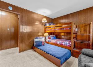 a bedroom with two bunk beds in a boat at 1st Cabin in Homewood +46 photos