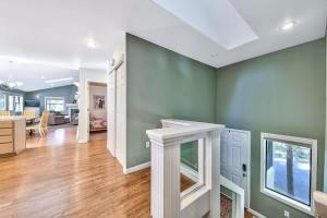 a living room with green walls and a white counter at Minnow's Run in Kings Beach