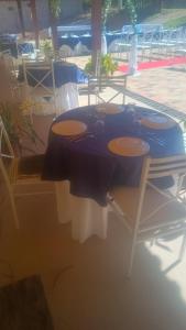 a table with four drums on top of it at Chácara Desejo do Coração 1 in Juquitiba