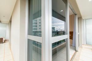 a view from the balcony of a building at Vision Hotel em Brasília 60300 in Brasília
