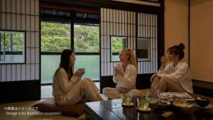 a group of women sitting in a room at AKAMA Kamakura in Kamakura