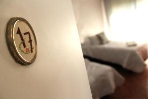 Mon Petit Hotel客房内的一张或多张床位