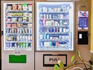 a refrigerator is full of food and drinks at ibis budget Wrocław Stadion in Wrocław