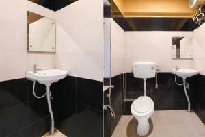 a bathroom with a toilet and a sink at Super Collection O Rajarhat Formerly Redstone in Kolkata