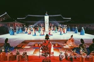 a stage with a group of people in dresses at stay young in Suwon