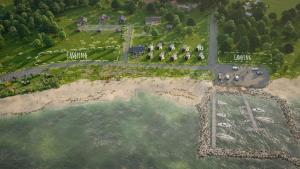 an aerial view of a resort on the beach at Tiny SeaSide - Loddenhøj in Aabenraa