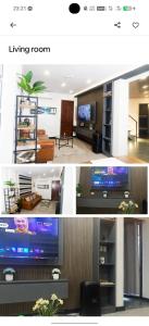 a living room with a large screen tv and a living room at Casa Junquera in Cebu City