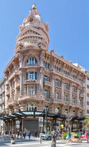 a large building on the corner of a street at Primo Piano in Sparano in Bari