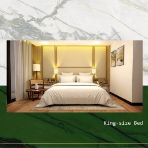 a bedroom with a king size bed and a king size bed at Brio de Agoho Zambales by Cherry in Candelaria