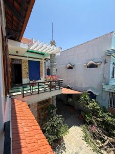 an outside view of a house with a patio at Hạnh Homestay in Thôn Trị Thủy +67 photos