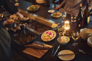 a table full of food and glasses of wine at Hiire IZU OMURO in Ito +18 photos