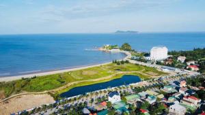 an aerial view of a resort and the ocean at Lan Chau Luxury Hotel in Cửa Lô