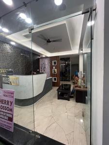 a living room with a skateboard on the wall at Cherry Blossom in Varanasi
