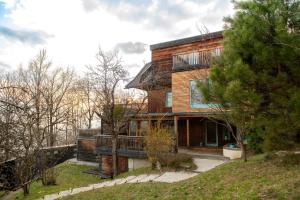 a wooden house in the middle of a forest at Soami Spaces - Alpine Hideaway in Millstatt